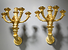A fine pair of Restauration gilt bronze five-light wall-lights